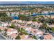 Panoramic aerial shot capturing the picturesque community, lush landscapes, and sparkling lake views at 8228 Lauderdale Ct, Las Vegas, NV 89128