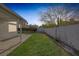 Spacious backyard with low-maintenance landscaping and a tall privacy wall at 8228 Lauderdale Ct, Las Vegas, NV 89128
