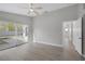 Bedroom with a ceiling fan and sliding door that leads to the backyard patio at 8228 Lauderdale Ct, Las Vegas, NV 89128
