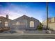 Charming single-story home with a well-maintained lawn at 8228 Lauderdale Ct, Las Vegas, NV 89128