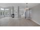 Spacious living room featuring a fireplace and plenty of natural light at 8228 Lauderdale Ct, Las Vegas, NV 89128
