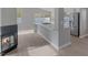 Open-concept layout combining living, dining, and kitchen areas with new flooring at 8228 Lauderdale Ct, Las Vegas, NV 89128