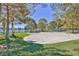 Lakeside recreation area featuring a volleyball court, basketball court, picnic tables, and green space at 8228 Lauderdale Ct, Las Vegas, NV 89128