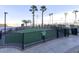 Well-maintained community dog park with green space, fencing, and mature trees for pet owners at 8255 Las Vegas Blvd # 1422, Las Vegas, NV 89123
