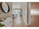 Bright entryway leads to an open-concept living area with sleek console and wood-look floors at 8255 Las Vegas Blvd # 1422, Las Vegas, NV 89123