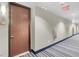 Hallway view of an apartment building, including the apartment's door at 8255 Las Vegas Blvd # 1422, Las Vegas, NV 89123