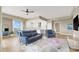 Open-concept living area with mountain views features modern furnishings and an adjacent dining space at 8255 Las Vegas Blvd # 1422, Las Vegas, NV 89123