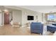 Spacious living area with seating and media center flows seamlessly from the entrance at 8255 Las Vegas Blvd # 1422, Las Vegas, NV 89123