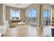 Bright and airy living area features a playroom, floor-to-ceiling windows, and mountain views at 8255 Las Vegas Blvd # 1422, Las Vegas, NV 89123