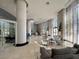 Bright lobby featuring neutral furniture, soaring ceilings, and floor to ceiling windows at 8255 Las Vegas Blvd # 1422, Las Vegas, NV 89123