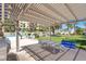 Poolside featuring a grill, shade structure, a table and seating at 8255 Las Vegas Blvd # 1422, Las Vegas, NV 89123