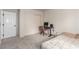 Bedroom featuring a desk, neutral carpet, and a door that leads outside at 905 Possum Hill St, Henderson, NV 89014
