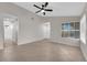 Spacious living room with tile floors and many windows at 908 Coral Isle Way, Las Vegas, NV 89108