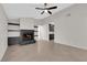 Bright living room featuring a cozy brick fireplace at 908 Coral Isle Way, Las Vegas, NV 89108