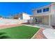 A great backyard with an oversized pool and covered patio at 9541 Summersweet Ct, Las Vegas, NV 89123