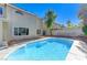 Backyard view featuring a bright blue pool, providing a refreshing outdoor oasis at 9541 Summersweet Ct, Las Vegas, NV 89123
