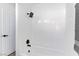 Bathroom featuring modern tile shower and bathtub at 9541 Summersweet Ct, Las Vegas, NV 89123