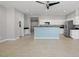 Bright living room featuring neutral walls, tile flooring and ceiling fan at 9624 Twelve Pins Dr, Las Vegas, NV 89129