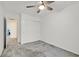 Bedroom with ceiling fan, closet and doorway to other rooms at 9815 Ramhorn Canyon St, Las Vegas, NV 89183