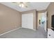 Bedroom with carpet, ceiling fan and closet with view of the hallway at 9815 Ramhorn Canyon St, Las Vegas, NV 89183