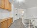 Upstairs landing area with built in cabinets and railing overlooking the entry at 9815 Ramhorn Canyon St, Las Vegas, NV 89183