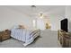 Comfortable main bedroom featuring neutral tones, and walk-in closet at 9815 Ramhorn Canyon St, Las Vegas, NV 89183
