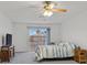 Relaxing main bedroom with sliding doors to a private balcony overlooking neighborhood at 9815 Ramhorn Canyon St, Las Vegas, NV 89183