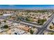 Overhead neighborhood view highlights the community layout with nearby schools, roads and surrounding landscaping at 997 N Christy Ln, Las Vegas, NV 89110