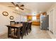 Bright dining area featuring tile floors and ample seating at the table at 997 N Christy Ln, Las Vegas, NV 89110