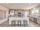 Modern kitchen with stainless steel appliances, a large island, and bar stool seating at 1019 Gentle Swan St # 693, Henderson, NV 89011