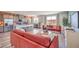 Bright living space with open floor plan seamlessly connecting the kitchen, dining, and living areas at 1019 Gentle Swan St # 693, Henderson, NV 89011
