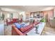 Stylish living room with an open design, seamlessly connecting to the kitchen and dining areas at 1019 Gentle Swan St # 693, Henderson, NV 89011