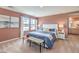 Serene main bedroom with large windows providing natural light and a sitting area, creating a relaxing retreat at 1019 Gentle Swan St # 693, Henderson, NV 89011
