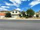 Attractive two-story house with an attached garage and mature landscaping in a tranquil neighborhood at 1021 Calico Ridge Dr, Henderson, NV 89011