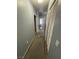 Hallway with storage closet leading to a bedroom at 10245 S Maryland Pkwy # 2216, Las Vegas, NV 89183