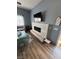 Living room with a decorative electric fireplace at 10245 S Maryland Pkwy # 2216, Las Vegas, NV 89183