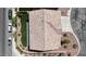 An overhead aerial view of the home with a multi-tone tile roof and manicured landscaping at 10508 Waking Cloud Ave, Las Vegas, NV 89129