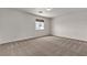Large bedroom features a window for natural light and plush carpet for added comfort at 10508 Waking Cloud Ave, Las Vegas, NV 89129