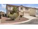 Attractive two-story home featuring a tile roof and well-maintained landscaping at 10508 Waking Cloud Ave, Las Vegas, NV 89129