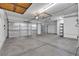 Three car garage offering ample room for storage, work area, and parking at 10508 Waking Cloud Ave, Las Vegas, NV 89129