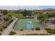 Well-maintained community basketball court surrounded by lush landscaping, perfect for outdoor play at 1105 Strada Pecei, Henderson, NV 89011
