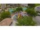 Community playground with basketball court and a shaded seating area for outdoor fun at 1105 Strada Pecei, Henderson, NV 89011