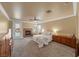 Inviting bedroom with a fireplace, ceiling fan, and access to the outdoor pool area at 11275 Gammila Dr, Las Vegas, NV 89141