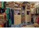Walk-in closet with custom shelving and ample storage space at 11275 Gammila Dr, Las Vegas, NV 89141