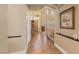 Inviting foyer with tile flooring, chandelier, and staircase leading to the upper level at 11275 Gammila Dr, Las Vegas, NV 89141