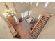 A high-angle view of the foyer showcasing the grand entrance, staircase and dining space at 11275 Gammila Dr, Las Vegas, NV 89141