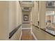 Hallway featuring detailed trim and architectural details throughout the home at 11275 Gammila Dr, Las Vegas, NV 89141