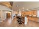 Open kitchen offers granite countertops, stainless appliances, breakfast bar and traditional style cabinets at 11275 Gammila Dr, Las Vegas, NV 89141