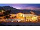 Aerial view of home highlighting the pool, patio and mountain views at 12217 Tempestad Ave, Las Vegas, NV 89138