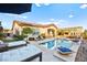 Beautiful backyard with sparkling pool, lounge chairs, and outdoor pergola at 12217 Tempestad Ave, Las Vegas, NV 89138